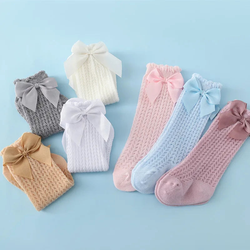 Adorable Baby Knee-High Lace Socks with Bow Accent – Perfect for Special Occasions and Everyday Wear