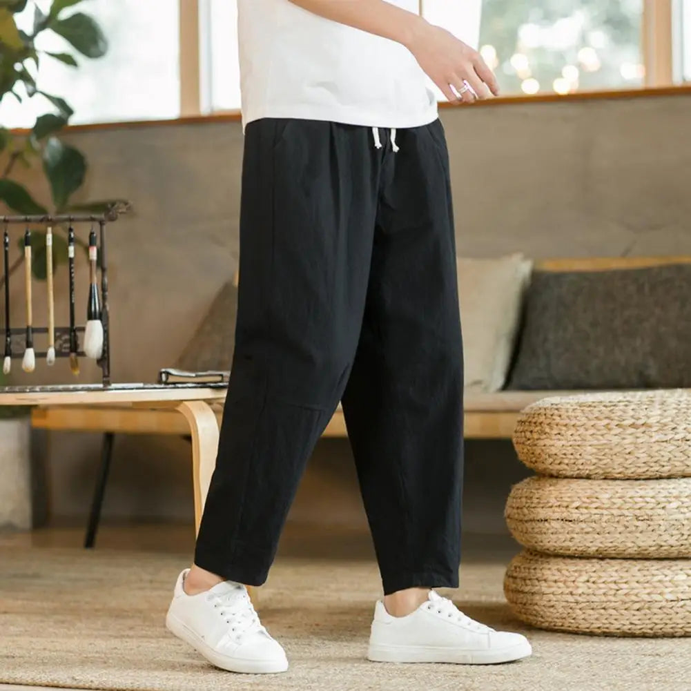 Comfortable Loose-Fit Casual Pants for Men with Elastic Waistband and Breathable Fabric, Perfect for Relaxed Outings and Everyday Wear