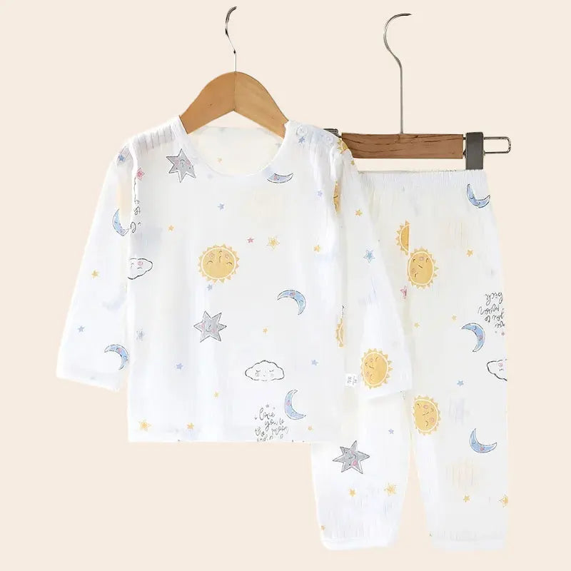 Sun, Moon, and Stars Patterned Long-Sleeve Pajama Set for Toddlers – Soft and Cozy Sleepwear