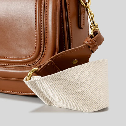 Vintage-Inspired Saddle Bag with Structured Design and Wide Detachable Strap