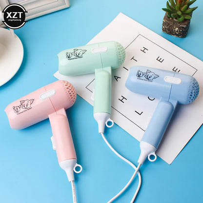 Compact and Lightweight Mini Hair Dryer with Cute Cartoon Design, Ideal for Travel and Daily Use, Featuring a Foldable Handle and Multiple Speed Settings