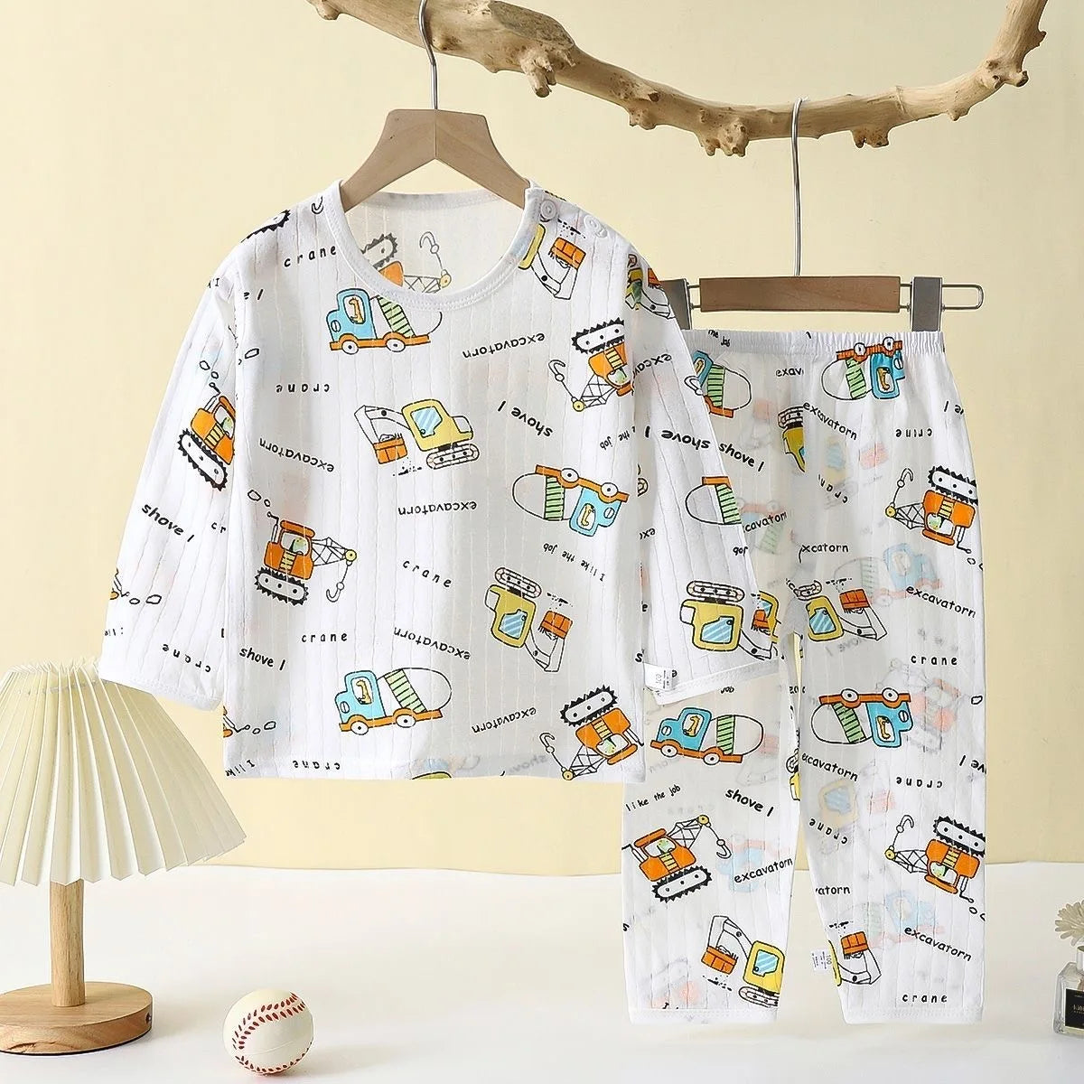 Sun, Moon, and Stars Patterned Long-Sleeve Pajama Set for Toddlers – Soft and Cozy Sleepwear