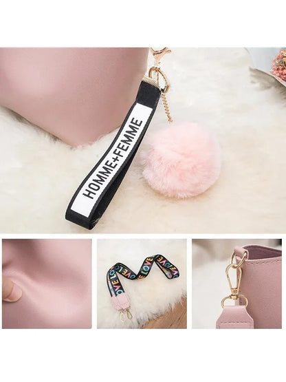 Fashionable Bucket Bag for Women with Multicolor LOVE Strap and Pom Pom Charm