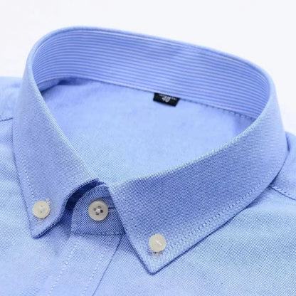 Premium Cotton Button-Down Oxford Shirt with Striped Collar Detail, Long Sleeves, and Classic Chest Pocket Design for Men.