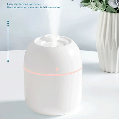 Compact Water Drop Humidifier with Silent Operation, Colorful Night Lights, and USB-Powered Design for Desktop Use