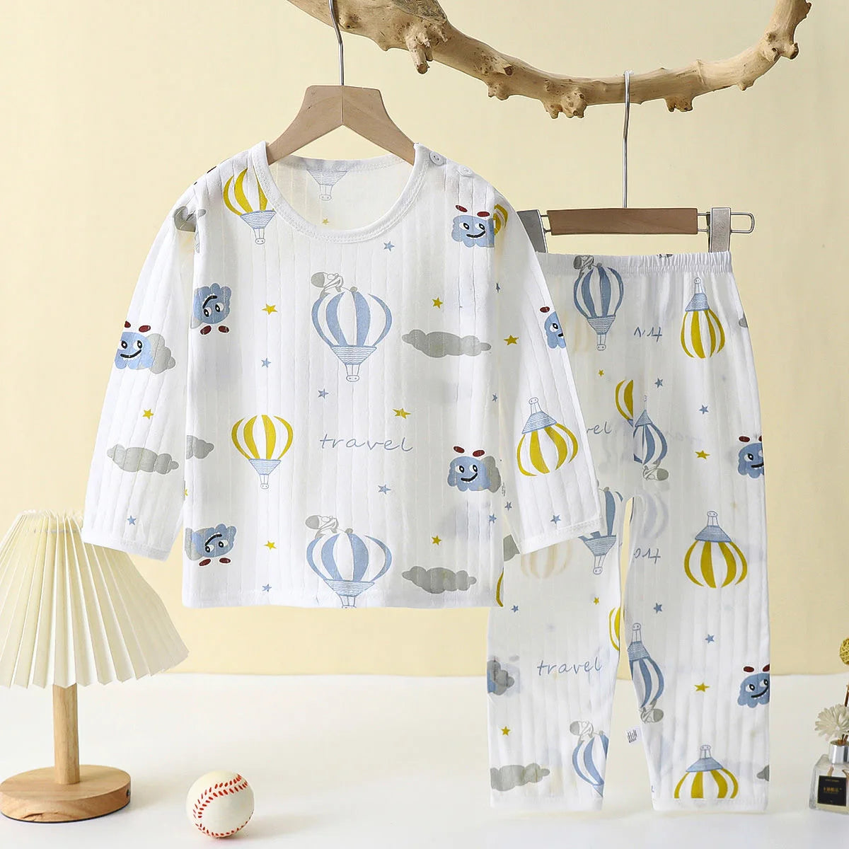 Sun, Moon, and Stars Patterned Long-Sleeve Pajama Set for Toddlers – Soft and Cozy Sleepwear