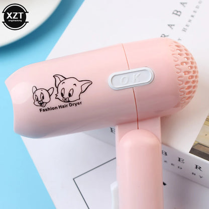 Compact and Lightweight Mini Hair Dryer with Cute Cartoon Design, Ideal for Travel and Daily Use, Featuring a Foldable Handle and Multiple Speed Settings