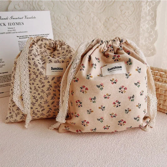 Elegant Drawstring Fabric Bags with Delicate Floral Patterns for Multi-purpose Use