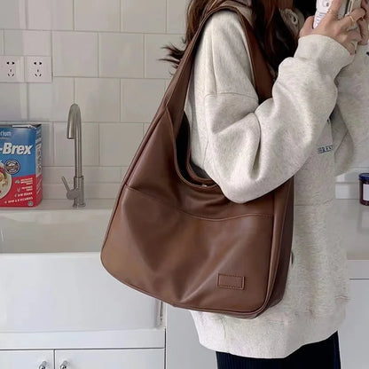 Minimalist Hobo Shoulder Bag for Women with Spacious Interior and Sleek Design