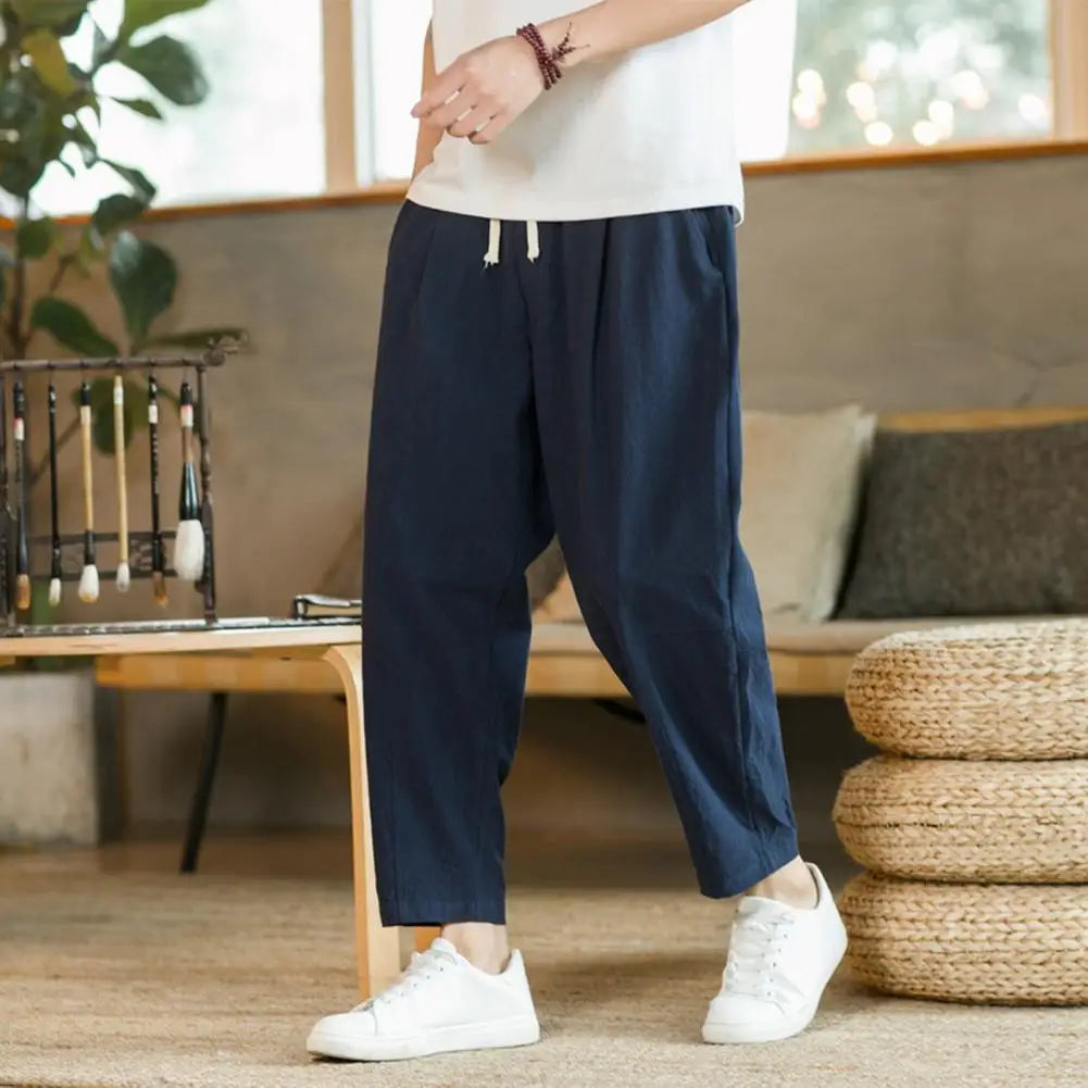 Comfortable Loose-Fit Casual Pants for Men with Elastic Waistband and Breathable Fabric, Perfect for Relaxed Outings and Everyday Wear