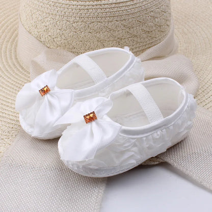 Soft Baby Mary Jane Flats with Large Bow Detail and Elastic Strap for Secure Fit