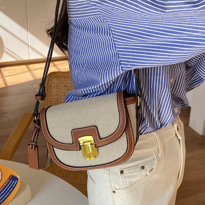 Vintage-Inspired Saddle Bag with Elegant Buckle Closure and Adjustable Strap