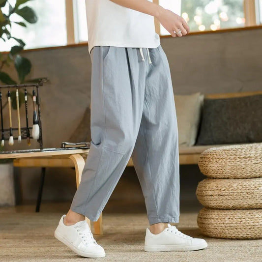 Comfortable Loose-Fit Casual Pants for Men with Elastic Waistband and Breathable Fabric, Perfect for Relaxed Outings and Everyday Wear