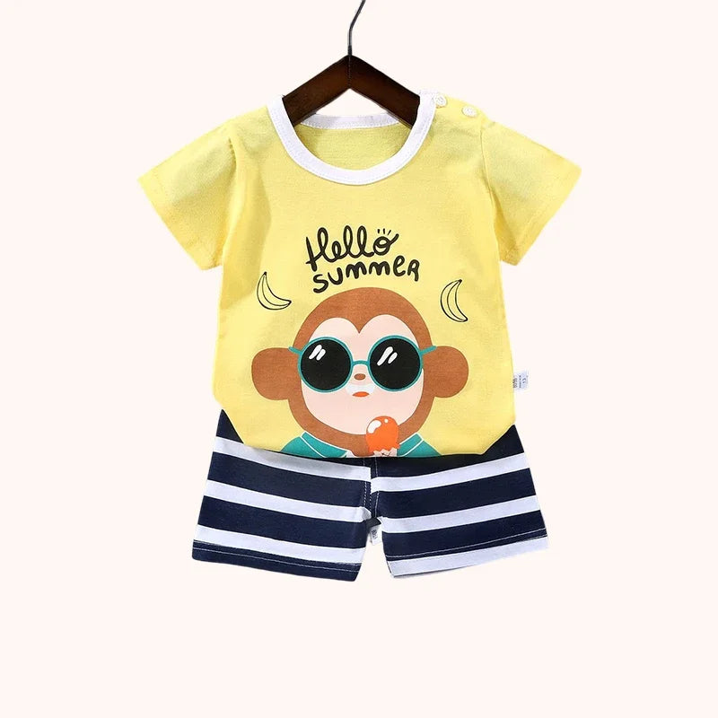 Adorable Toddler Summer Outfits with Fun Cartoon Prints, Perfect for Playtime and Casual Wear.