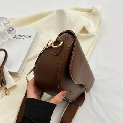 Chic Saddle Crossbody Bag for Women with Curved Flap and Adjustable Strap