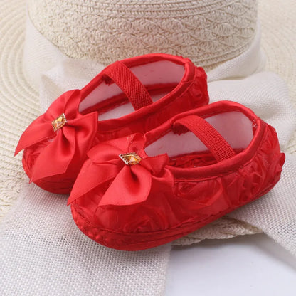 Soft Baby Mary Jane Flats with Large Bow Detail and Elastic Strap for Secure Fit