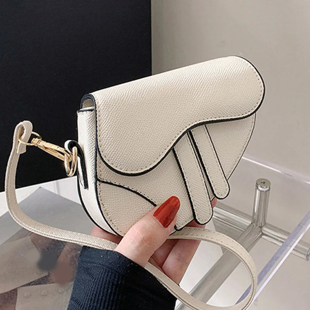 Elegant Mini Saddle Bag with Textured Finish and Detachable Strap