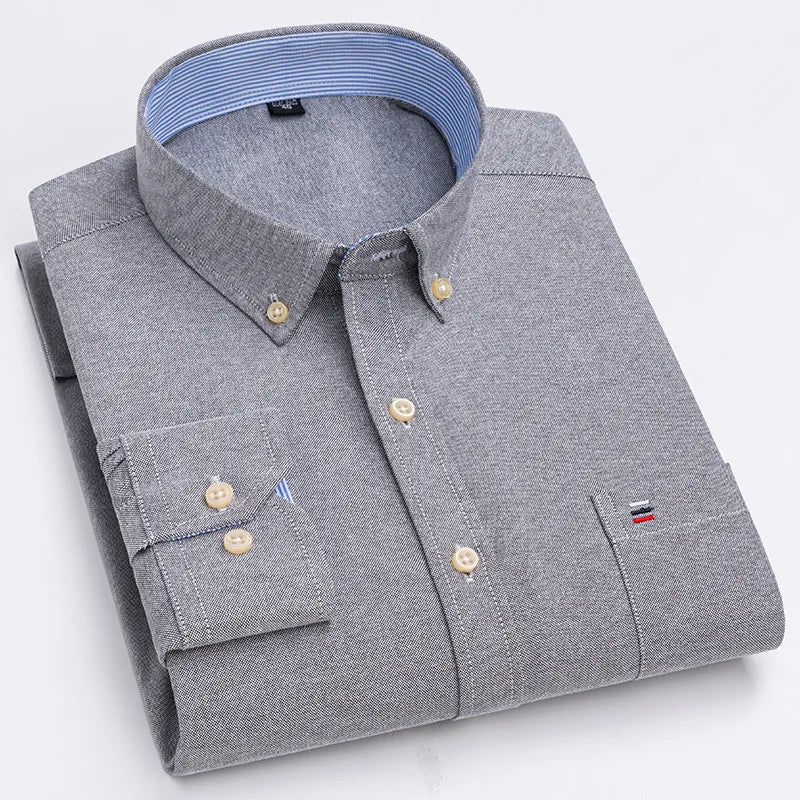 Premium Cotton Button-Down Oxford Shirt with Striped Collar Detail, Long Sleeves, and Classic Chest Pocket Design for Men.