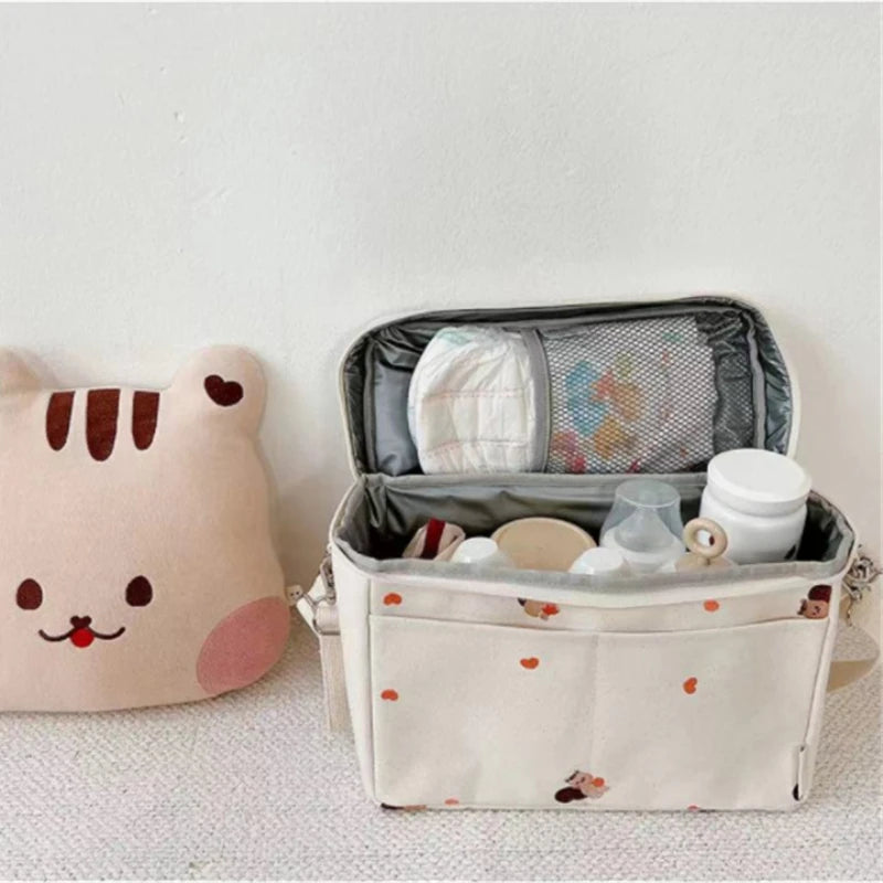 Spacious Multi-Functional Diaper Bag with Adorable Bear Pattern and Adjustable Straps for Easy Carrying