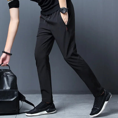 Men's Casual Jogger Pants with Elastic Drawstring Waist, Zipper Pockets, and Comfortable Fit for Everyday Wear and Fitness Activities