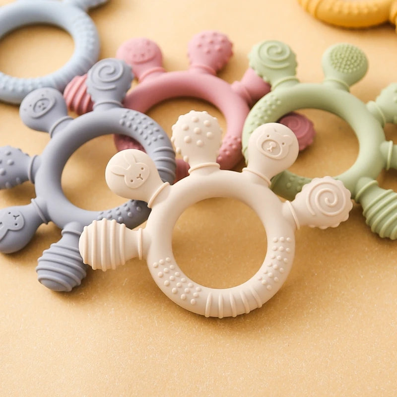 Textured Silicone Teething Rings for Babies with Various Patterns and Soft, Chewable Surfaces for Teething Relief and Sensory Development