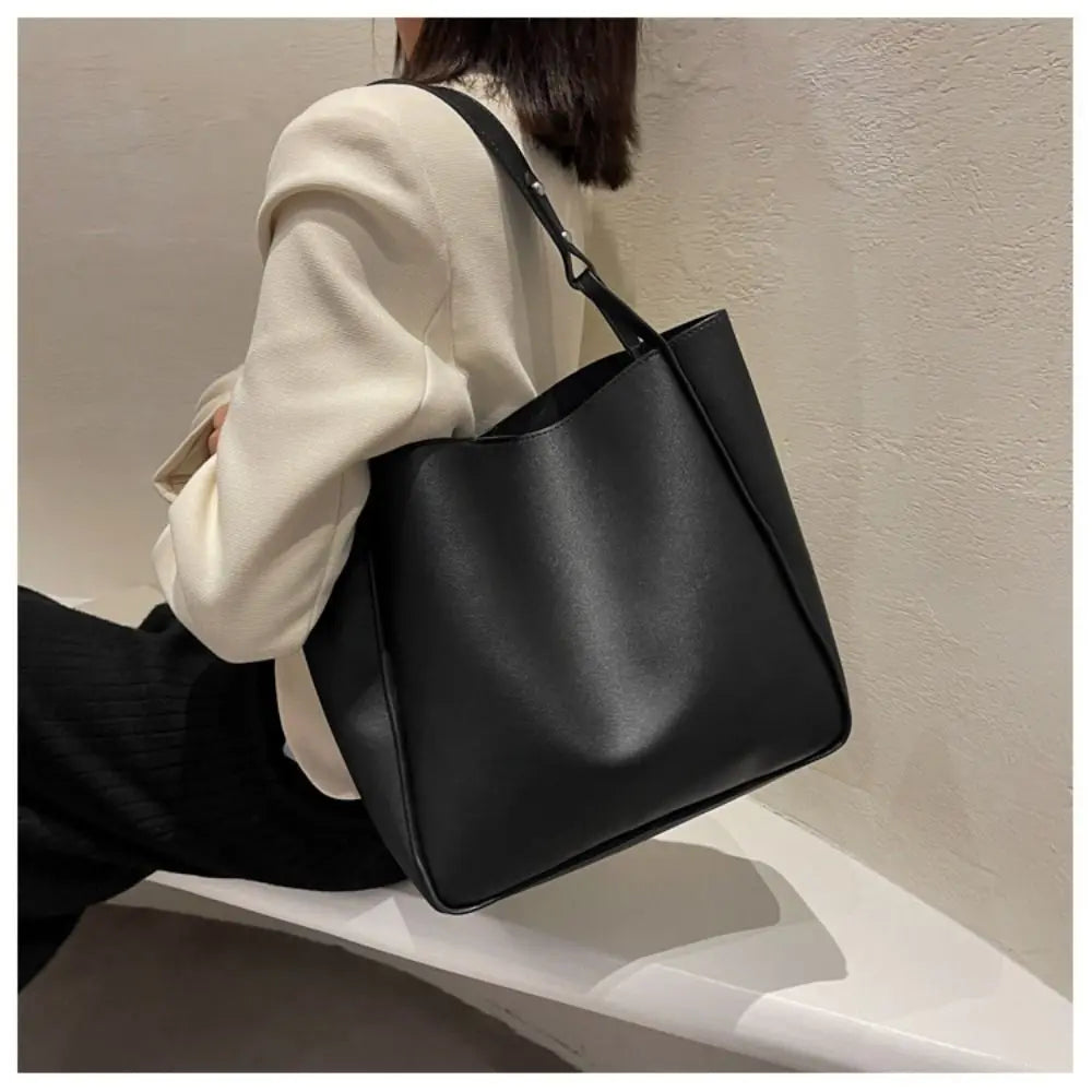 Spacious Minimalist Tote Bag with Adjustable Straps and Open Top Design