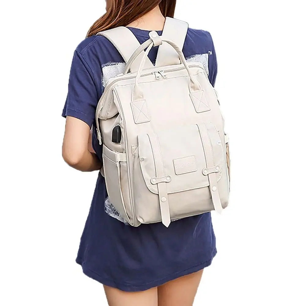 Spacious and Stylish Diaper Backpack with Multiple Compartments and Durable Fabric for Modern Parents