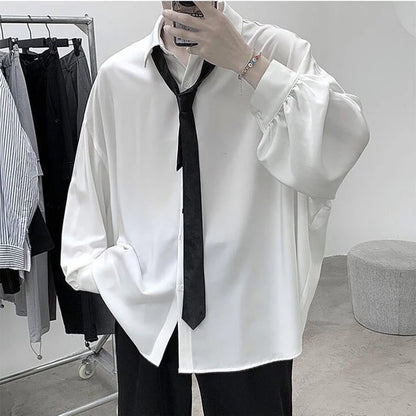 "Men's Long Sleeve Button-Up Shirt with Loose Fit and Elegant Turn-Down Collar Design"