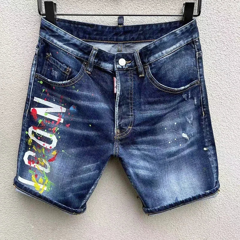 Men's Distressed Denim Shorts with Bold Lettering and Paint Splatter Design