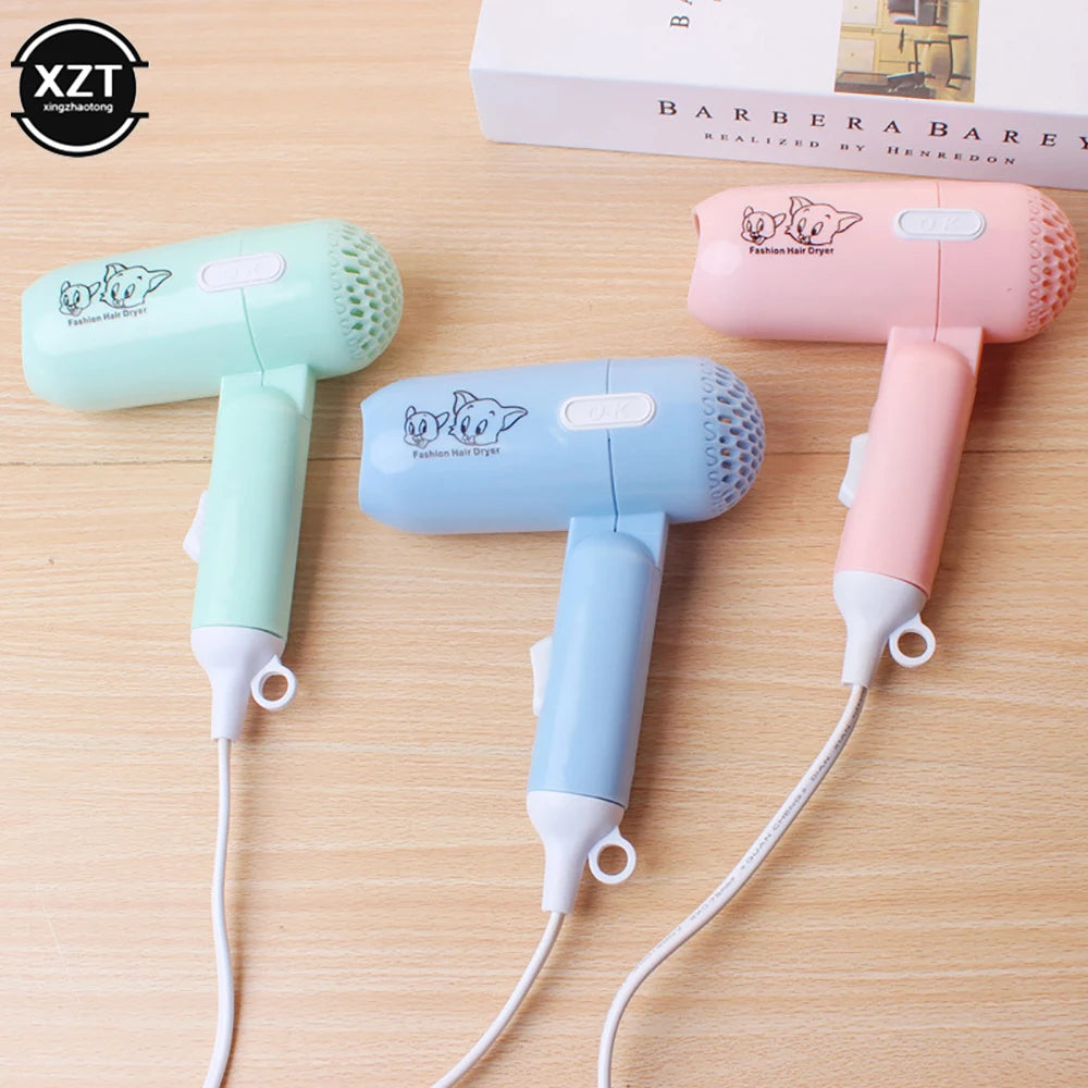 Compact and Lightweight Mini Hair Dryer with Cute Cartoon Design, Ideal for Travel and Daily Use, Featuring a Foldable Handle and Multiple Speed Settings