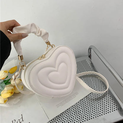 Heart-Shaped PU Leather Handbag with Padded Handle and Adjustable Shoulder Strap