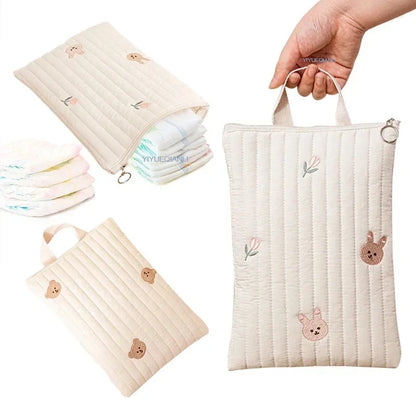 Quilted Diaper Pouch with Zipper Closure and Handle for Easy Organization and Transport of Baby Essentials