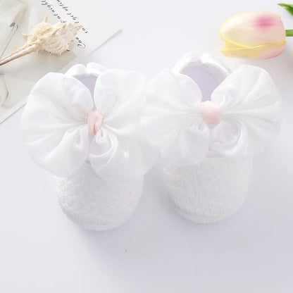 Soft Baby Mary Jane Flats with Large Bow Detail and Elastic Strap for Secure Fit