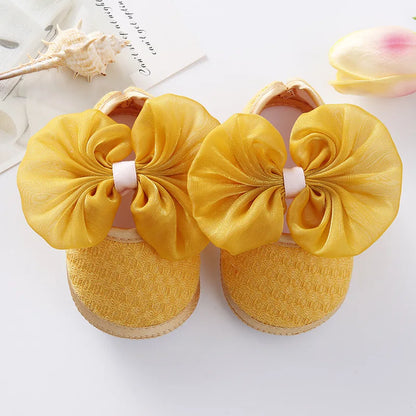 Soft Baby Mary Jane Flats with Large Bow Detail and Elastic Strap for Secure Fit