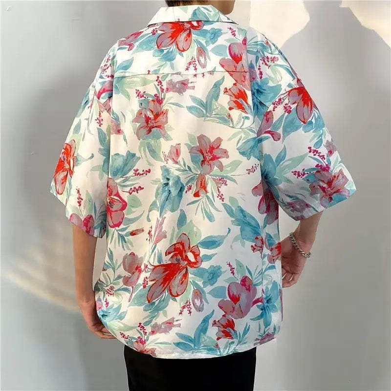 Men's short sleeve Hawaiian shirt with vibrant floral print, relaxed fit, and button-down design for a stylish and breezy summer look