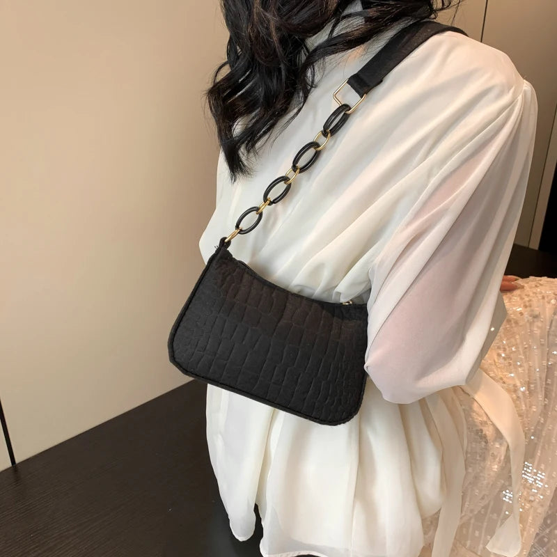 Stylish Textured Shoulder Bag with Chain Accent