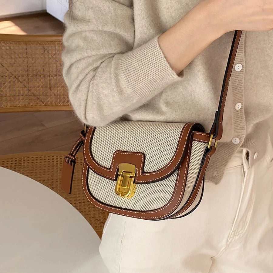 Vintage-Inspired Saddle Bag with Elegant Buckle Closure and Adjustable Strap