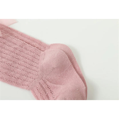 Knee-High Ribbed Socks for Girls with Delicate Bows and Soft Fabric