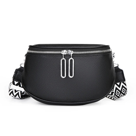 Sleek Leather Saddle Bag with Dual Zippers and Geometric Pattern Strap